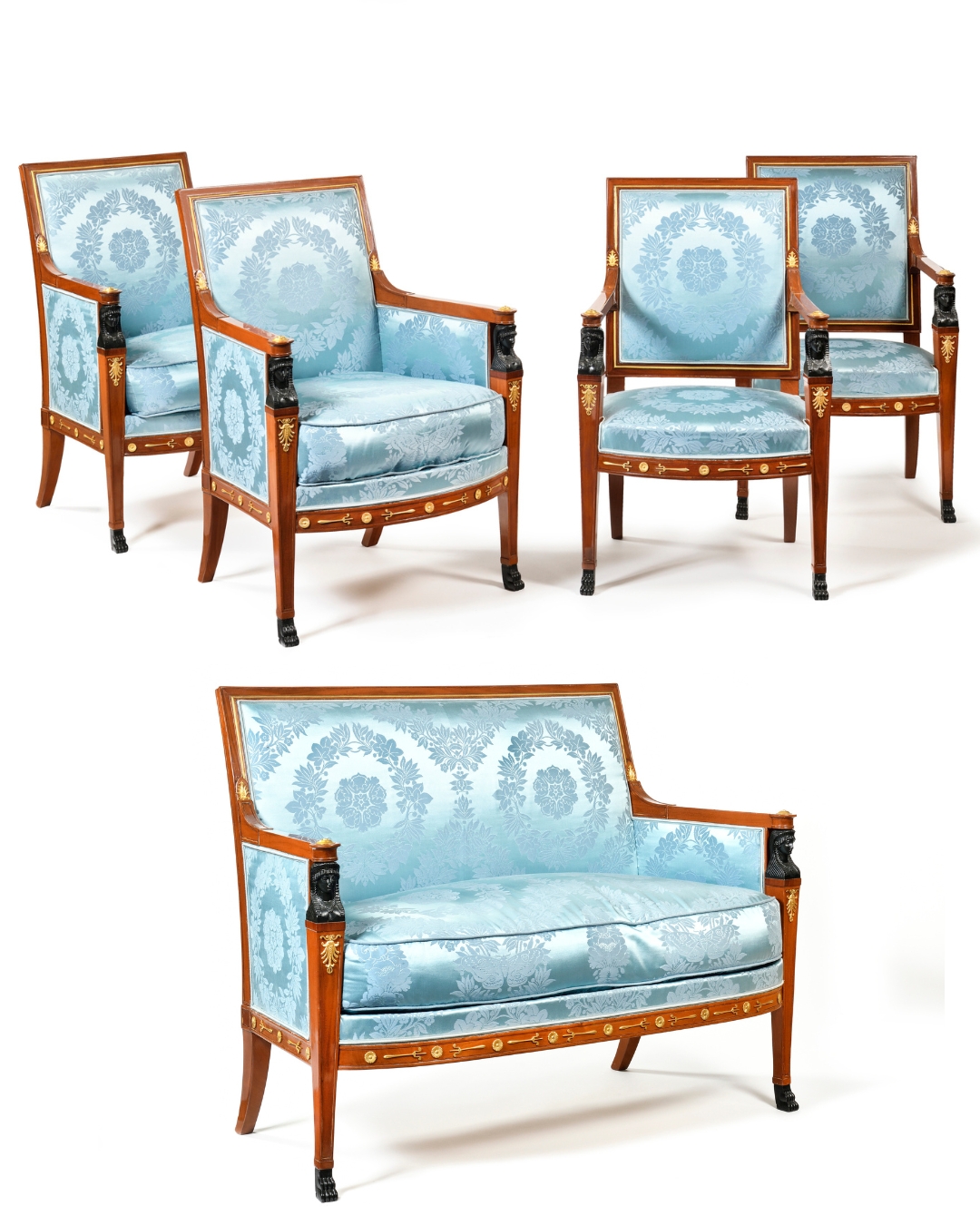 Suite de deux bergères, deux fauteuils et un canapé en acajou mouluré